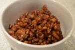 walnut meat in a white bowl