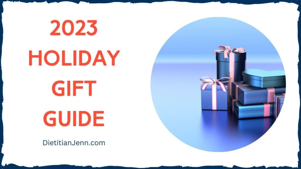 Red Text: "2023 Holiday Gift Guide" Blue Text" DietitianJenn.com with picture of 4 blue gifts in a pile
