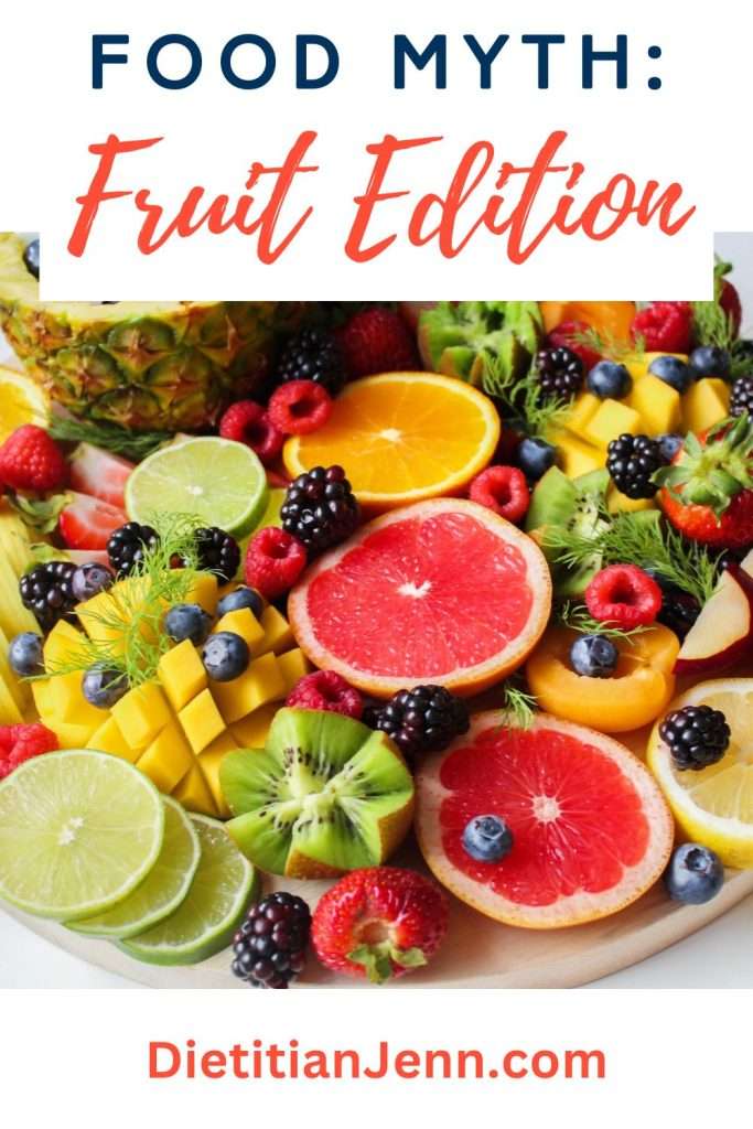 a wide variety of fruit almost covering a circular wooden board. Text above reads "Food Myth: Fruit Edition"