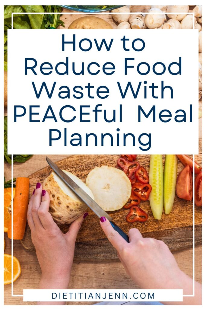 a very large variety of fruits and vegetables on a light wooden table. on a dark wooden cutting board a woman is slicing a yucca root. overlaid text reads, "How to Reduce Food Waste With PEACEful Meal Planning"