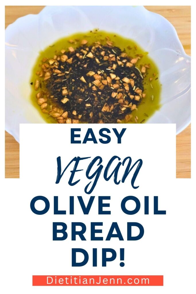 olive oil bread dip in a white bowl stylized like a flower on a light wooden surface. text below reads, "Easy Vegan Olive Oil Bread Dip!"