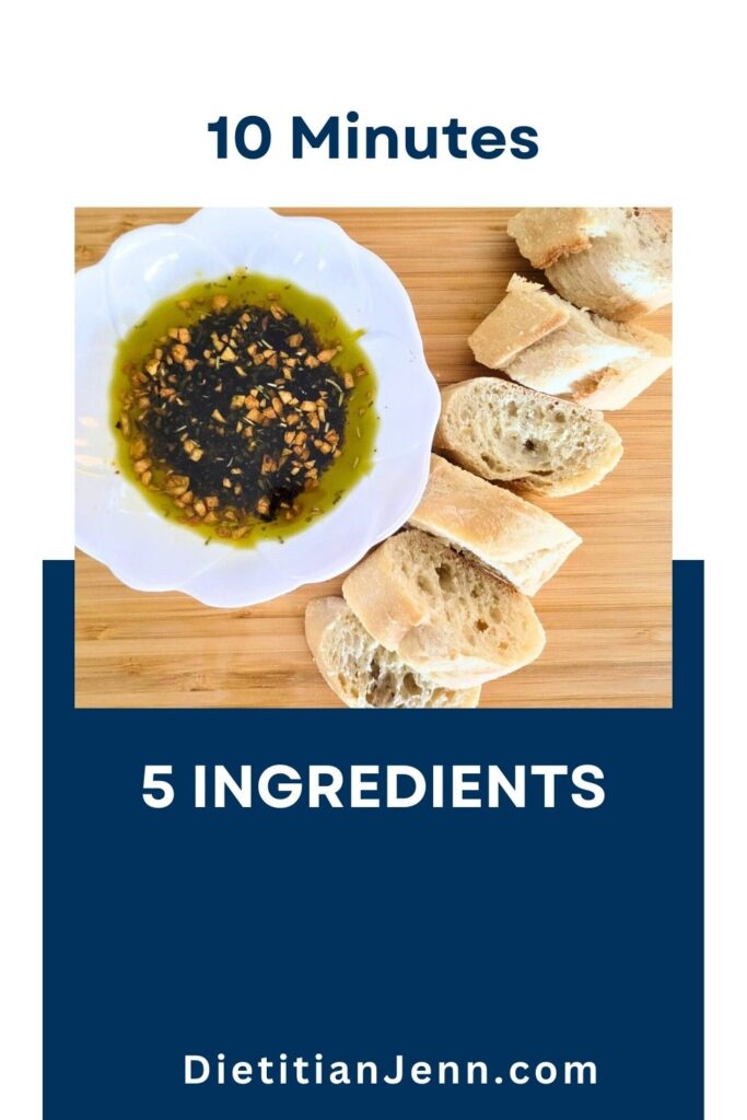 olive oil bread dip in a white bowl stylized like a flower on a light wooden surface, next to a sliced baguette. text reads, "10 minutes, 5 ingredients"