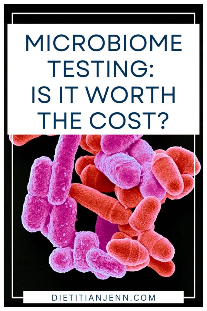 3D image of pink and red rod bacteria on a black surface. overlaid text reads, "Microbiome Testing: Is it Worth the Cost?"