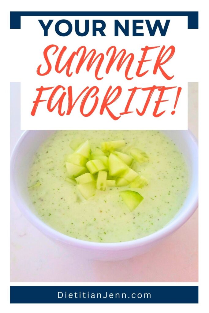 cucumber mint gazpacho in a white bowl, garnished with diced cucumbers, on a white marbled surface. text above reads, "Your New Summer Favorite!"