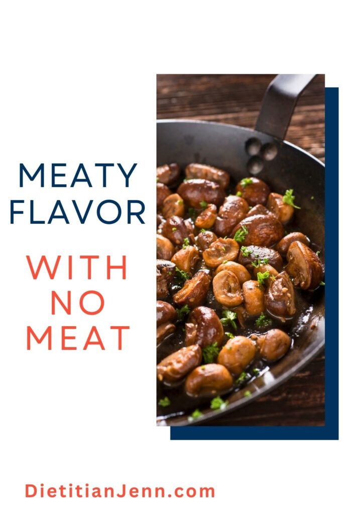 whole mushrooms cooking in brown and parsley in a skillet. Text to the left reads, "Meaty Flavor With No Meat"