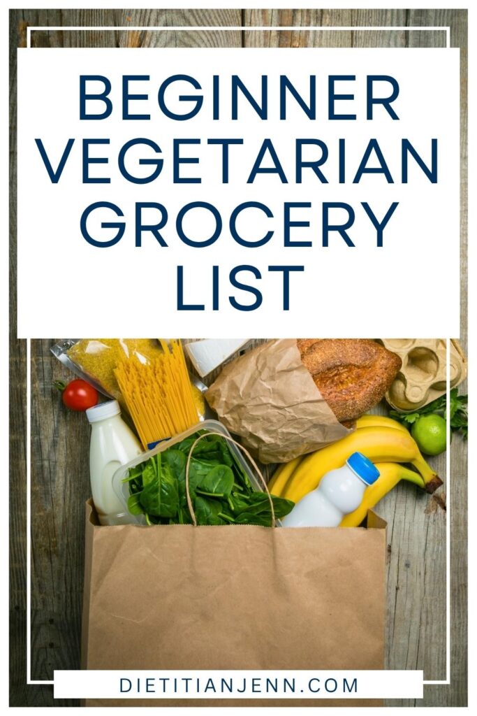 vegetarian groceries spilling out of a paper bag on a wooden surface. overlaid text reads, "Beginner Vegetarian Grocery List"