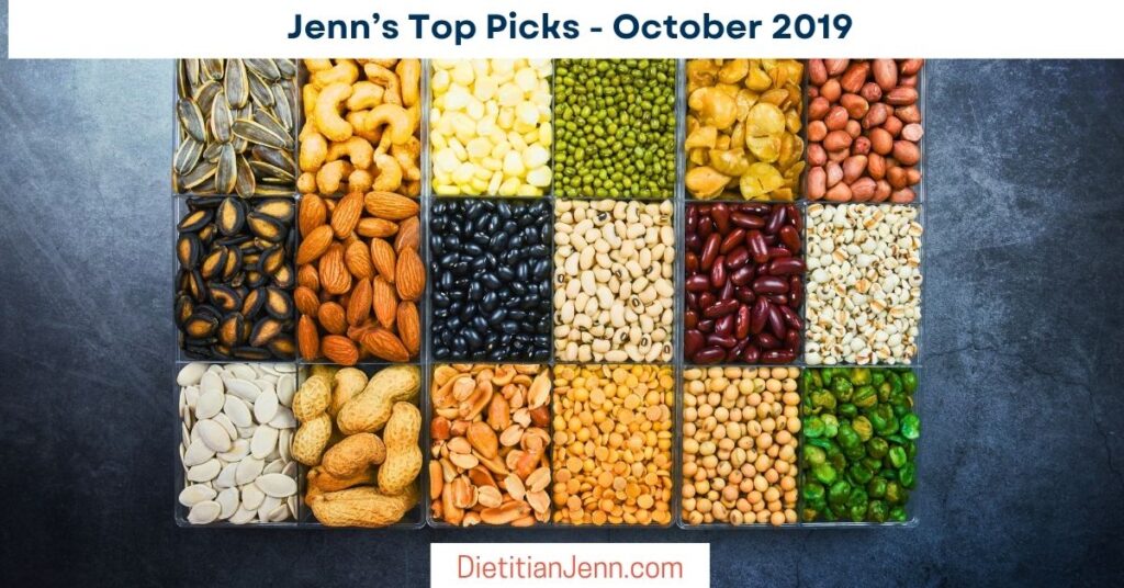 mixed nuts and beans in square clear containers on a grey background